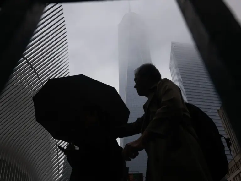 Flash flood warnings strike north-east US amid wildfire smoke from Canada
