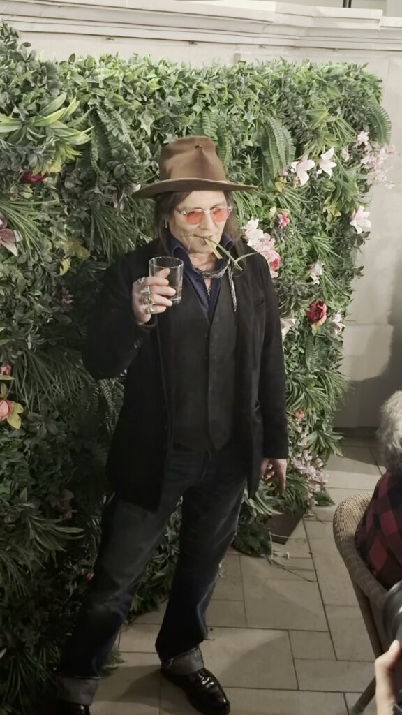 Johnny Depp eats decorative plant at Las Vegas party in bizarre video